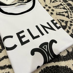 Gently used designer logo t-shirt. Size S